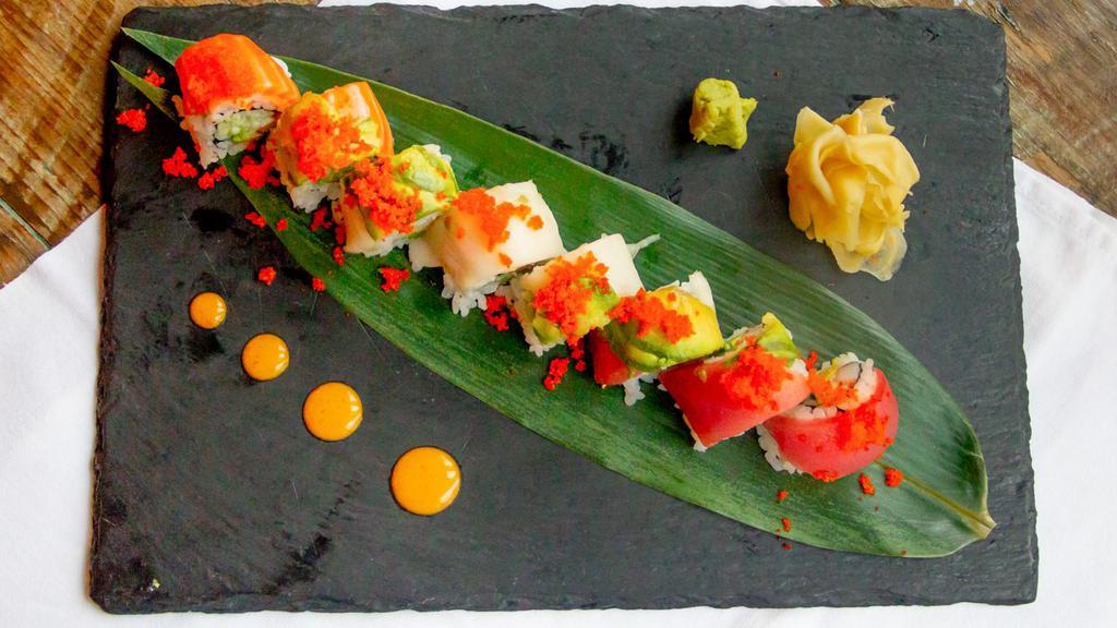 Rainbow Roll (6-8) · Six to eight pieces. Assorted raw fish and tobiko over California roll.