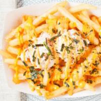 House Fries · French fries and crab mayo. Topped with seaweed flakes and spicy mayo.
