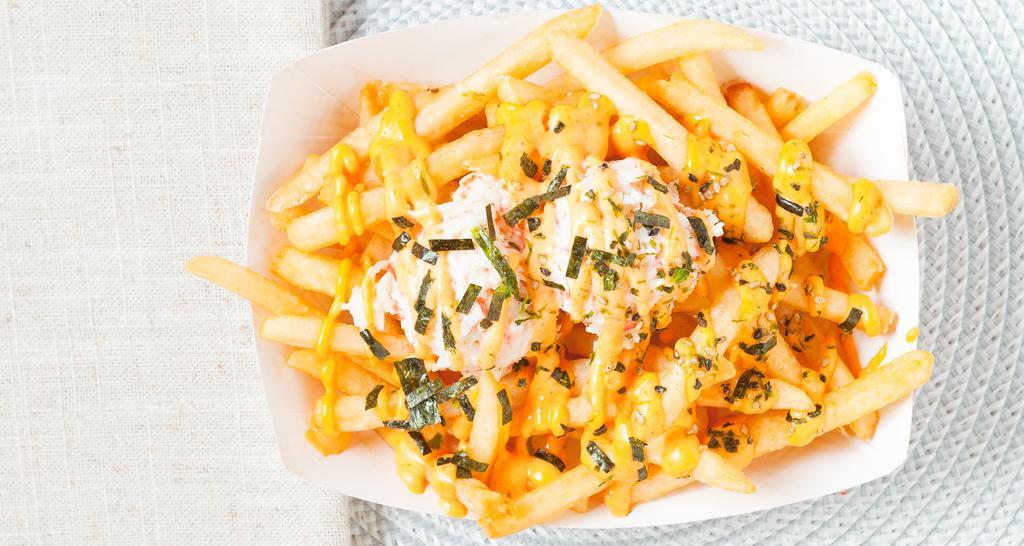 House Fries · French fries and crab mayo. Topped with seaweed flakes and spicy mayo.