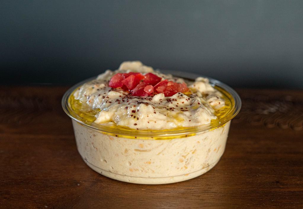 Baba Ghanoush · Roasted eggplant dip. contains dairy.
