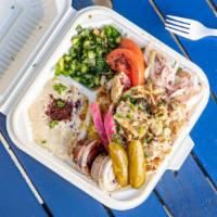 Chicken Shawarma Plate · Chicken with rice, seasoned onions, grilled tomatoes,  tabouli, hummus (substitute with any ...