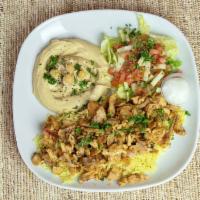Chicken Shawarma Plate · Our chicken shawarma plate is served with our delicious chicken shawarma, french fries, humm...