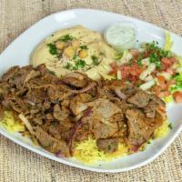 Lamb / Beef Shawarma Plate · Our lamb and beef shawarma plate is served with our delicious lamb / beef mix, french fries,...