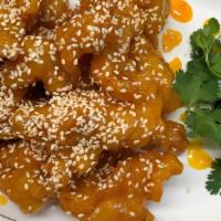 8. Crispy Chicken with Sesame · tender chicken golden deep fried , glazed with chef special candy sesame sauce, topping with...