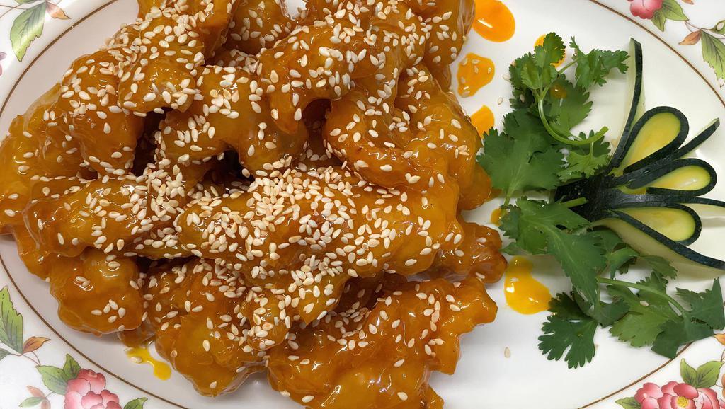 8. Crispy Chicken with Sesame · tender chicken golden deep fried , glazed with chef special candy sesame sauce, topping with sesame