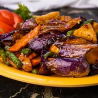 7. Rose Garden's Vegetable · Eggplant, string bean, tofu, carrots shiitake mushroom sauteed in spicy garlic sauce.