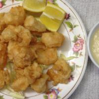 4. Coconut Prawns · Crispy Fried prawn coated with coconut and served with sweet creamy coconut sauce.