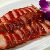 9. Honey B.B.Q. Pork · tender sliced pork roasted with honey BBQ sauce