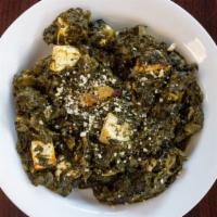 Palak Paneer · Cheese cubes cooked with spinach and spices.
