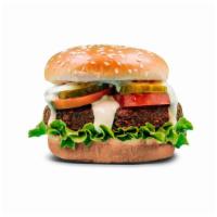 Falafel Burger · Vegan. 1/4 pound patty, tahini, leaf lettuce, pickles, shaved onions, Roma tomato.