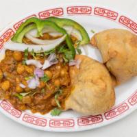 Vegetable Samosa(2pc) · 2 pieces. Crisp pastry stuffed with seasoned potatoes, green peas, and chole (garbanzo beans).