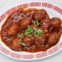 Veggie Manchurian · Indo-Chinese dish made with mixed vegetables deep fried with Chinese ingredients.
