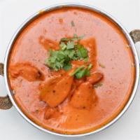 Chicken Tikka Masala · Boneless grilled chicken breast cubes in a creamy tomato masala sauce blended with special h...