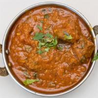 Lamb Curry · Lamb cooked in a traditional, mildly spicy curry masala.