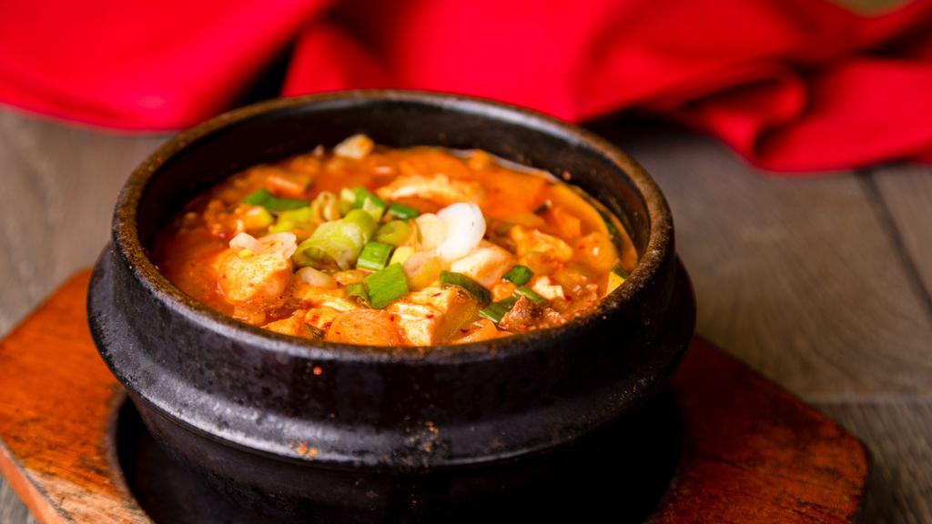 Soft Tofu Stew · Spicy soft tofu stew with beef, clams and vegetables.