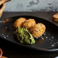 Croquetas de Champiñones · Shiitake mushrooms and Manchego cheese croquettes served with mojo verde.