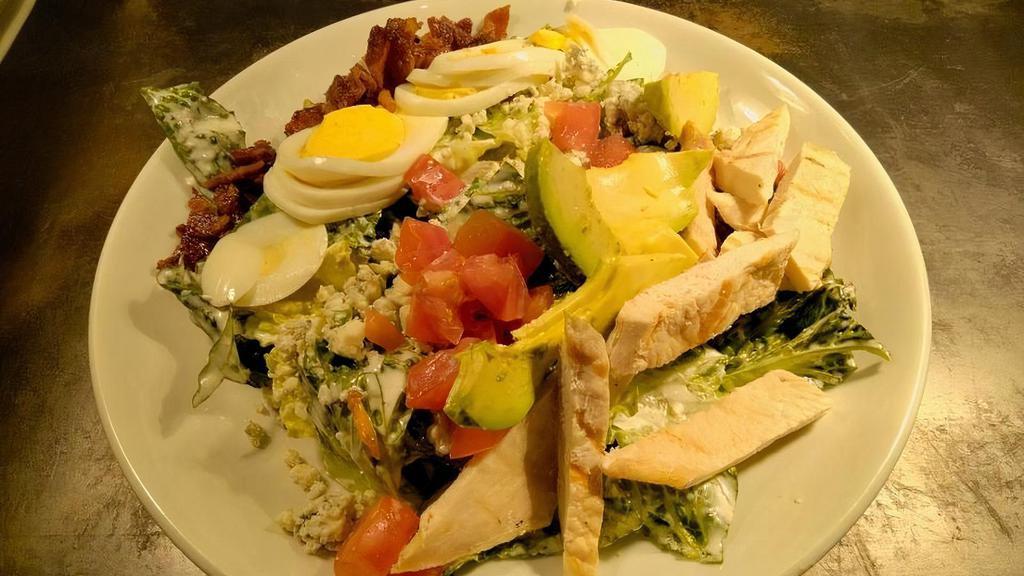 Summer Cobb* · Romaine Lettuce, Avocado, Bacon, Chopped Egg, Blue Cheese, Tomato, Grilled Chicken & Blue Cheese Dressing