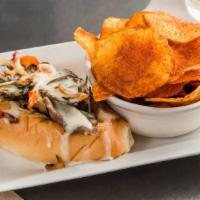 Philly Cheesesteak · Thinly Sliced Steak, Onions, Bell Peppers, Cheddar Cheese Sauce, Torpedo Roll