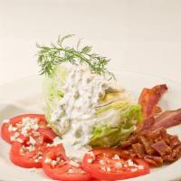 BLT Wedge · Blue cheese dressing topped with gorgonzola, bacon and fresh tomato.