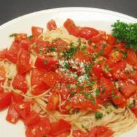 Cappellini Pomodori · Angel hair pasta with fresh tomatoes, garlic and basil