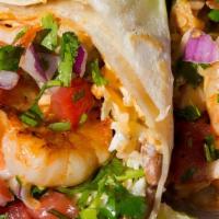 Cabo Burrito · Shrimp burrito: grilled shrimp, Monterey cheese, onions cilantro, bell peppers rice beans gu...