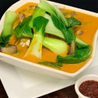 Kare Kare (32oz) · Tender chopped oxtail and Asian vegetables in peanut sauce.  Shrimp paste on the side included
