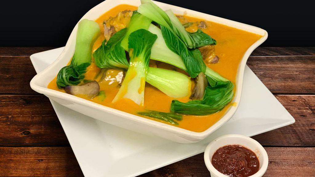 Kare Kare (32oz) · Tender chopped oxtail and Asian vegetables in peanut sauce.  Shrimp paste on the side included