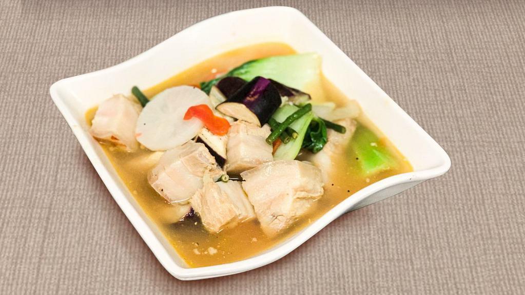 Pork Sinigang (32oz) · Pork cubes in tamarind based soup with long beans, bok choy and chinese eggplant