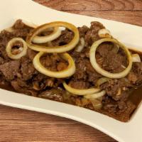 Beef Bistek (32oz) · Thinly cut tender beef slices cooked in soy sauce and calamansi (Filipino lime) with generou...