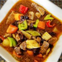 Pork Menudo (32oz) · Not the Mexican kind but the Filipino style.  Pork cubes, carrots, potato and peppers braise...