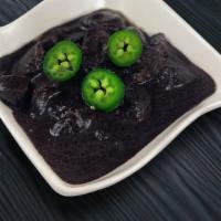 Pork Dinuguan (32oz) · Pork cubes cooked in pork blood.  Menu for the adventurous and brave.  Its either you like i...