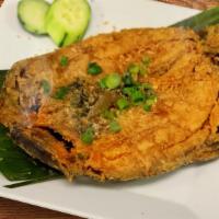Daing na Bangus · Deep Fried butterfly cut milkfish.  Milkfish is marinated in vinegar and garlic and other sp...