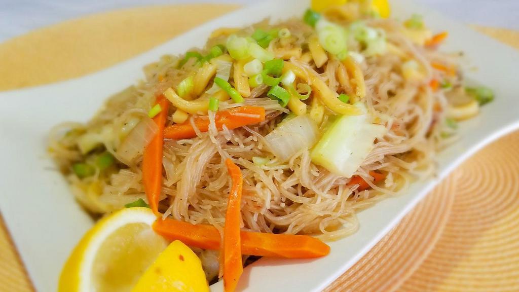 Pancit Miki Bihon · Rice noodles with thick egg noodles, chicken, shrimp & veggies wok fried in soy sauce and spices