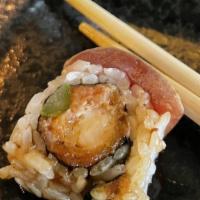 Blazing Glory · Spicy tuna& spicy salmon, shrimp tempura and asparagus topped with seared tuna, salmon, yell...