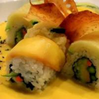The Veggie Roll · Asparagus, cucumber, avocado, carrot topped with mango and tempura zucchini  sesame seeds wi...
