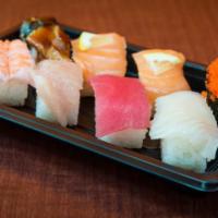 Nigiri Combo · Rice, seaweed, red tuna, tobiko, tamago, albacore tuna, squid and shrimp.