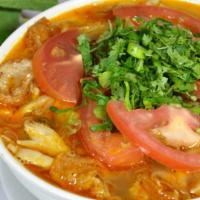 21. Tomato Noodle Soup (GFO) · Gluten-free optional. Vermicelli, tomato, soy protein, tofu, gluten, vegetables, cilantro, a...