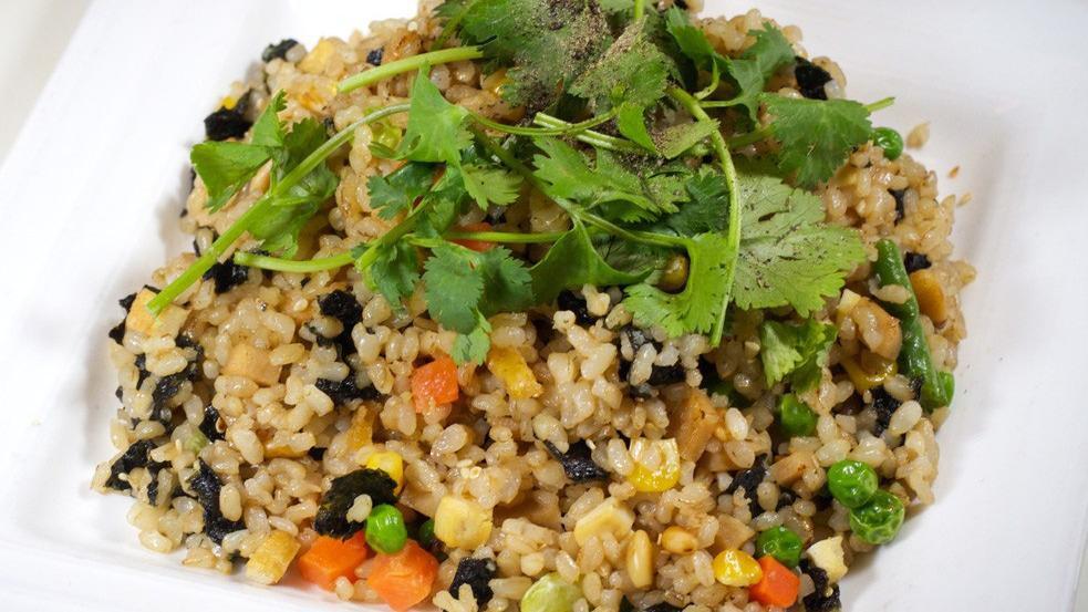 32. Royal Fried Rice (GFO) · Gluten-free optional. Fried brown rice with tofu, soy protein, vegetables, and seaweed.