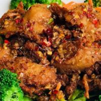 Sp4. Lemongrass Deluxe · Spicy. Golden era's most popular dish of spicy gourmet lemongrass soy chicken. Served with s...