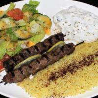 Kufta Plate · 2 Skewers Ground Lamb & Beef served with Rice, Green Salad & Taziki