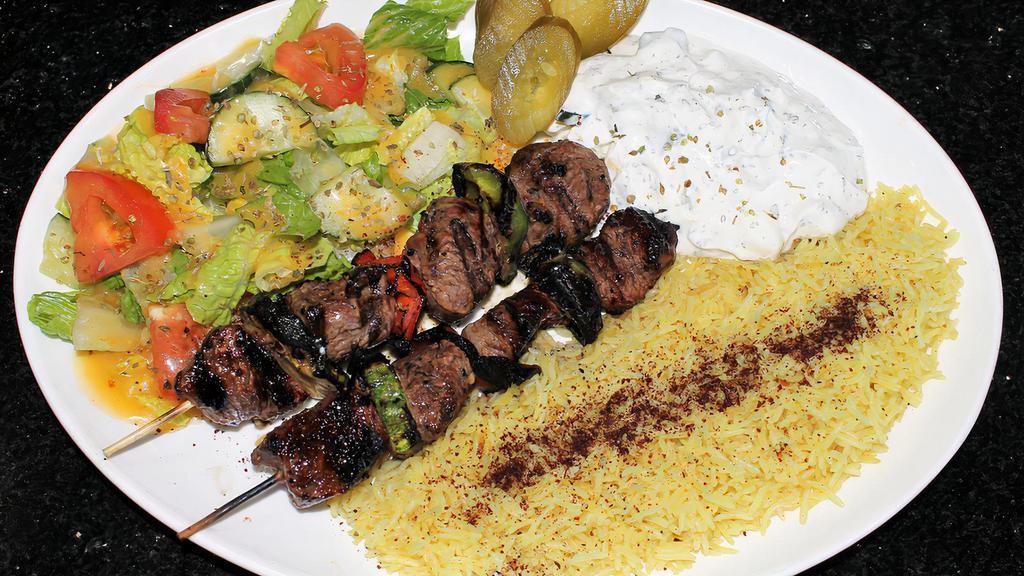 Beef Kabab Plate · 2 Beef Skewers served with Rice, Green Salad & Taziki