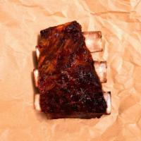 BBQ Smoked Beef Ribs · Our classic barbecue beef rib.