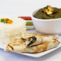 Paneer Masala · Served with basmati rice chutneys and roti.