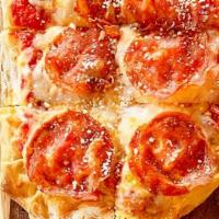 Red Sauce Pinsa · Rich and flavorful tomato sauce with a hint of Calabrian chili, Mozzarella cheese and spicy ...