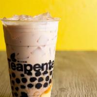 QQ Milk Tea · QQ Milk Tea is a classic milk tea that comes with triple toppings, which are boba, pudding a...
