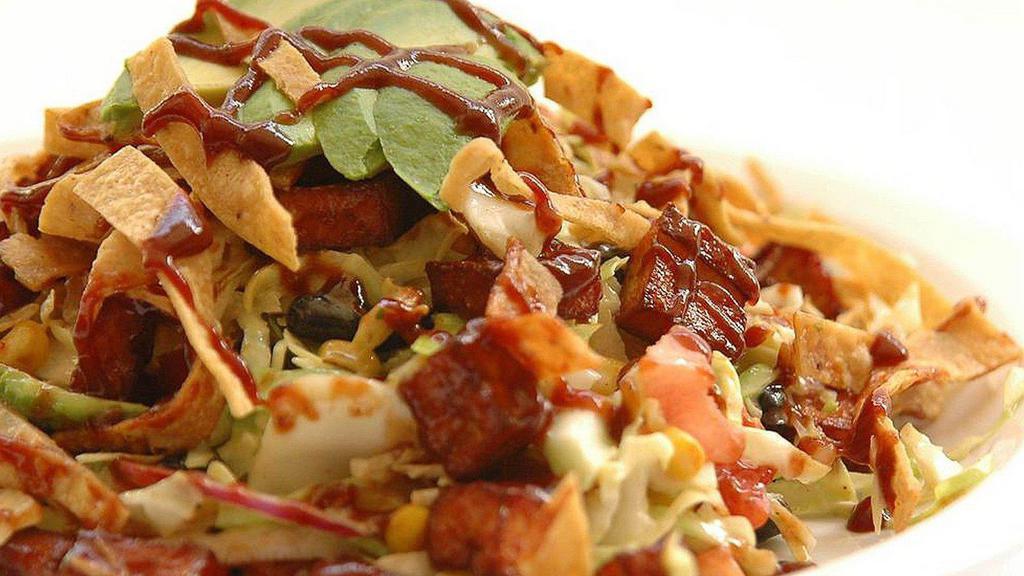 Chopped Cabbage Salad · BBQ chicken or BBQ veggie salami, black beans, yellow corn, avocados, tomatoes, onions and fried tortilla chips tossed with Parmesan- peppercorn ranch dressing.