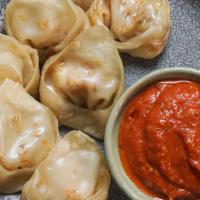 People's Paneer Momos · Minced paneer Nepali dumplings served with traditional dipping sauce. Choice of steamed, fri...