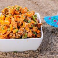 Sweet Potato Salad · Roasted sweet potato, green onions, and our spicy special sauce.