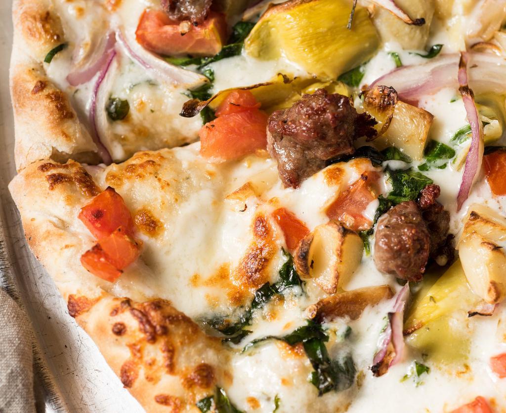 My Sausage Spinach Roasted Garlic - Medium · Signature pizza. Garlic white sauce, fresh spinach, mozzarella & aged parmesan cheese, sausage, roasted garlic, tomatoes, red onions and marinated artichoke hearts all topped with special lemony herb.