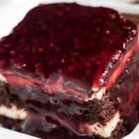 Double Chocolate Cake · Served with raspberry sauce.